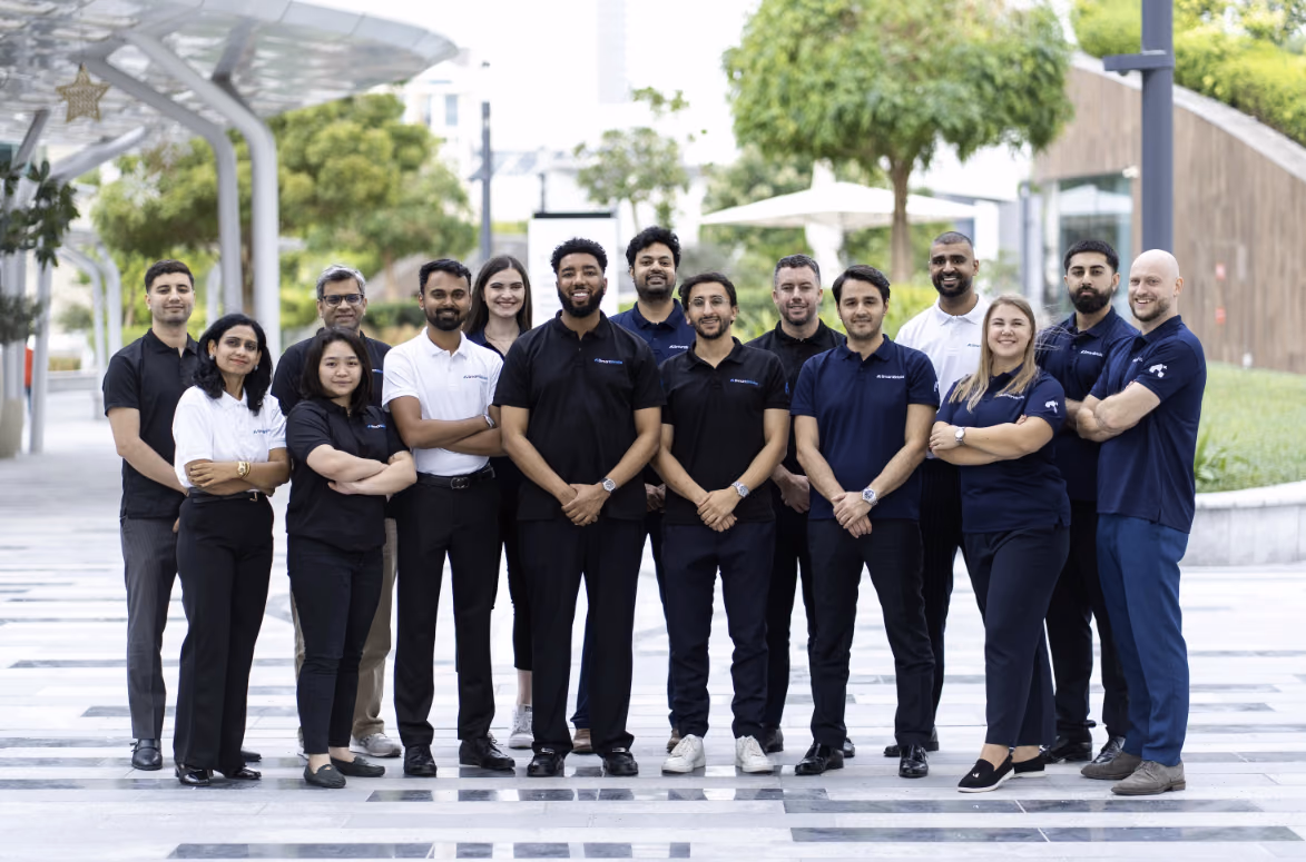 The Smart Bricks team outdoors in Dubai, in company polos