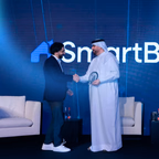 The Global PropTech and ConTech Award being presented to Smart Bricks on stage.