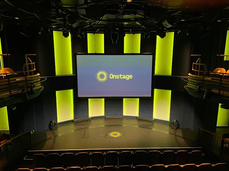 The Onstage stage and house screen at the W25 demo day.
