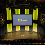 The Onstage stage and house screen at the W25 demo day.
